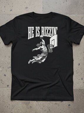 Funny Basketball Graphic T-Shirt | “He Is Rizzin” Dunk Tee | Sports Meme Shirt |